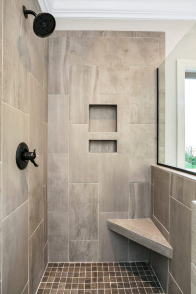Tile shower with soap inserts.