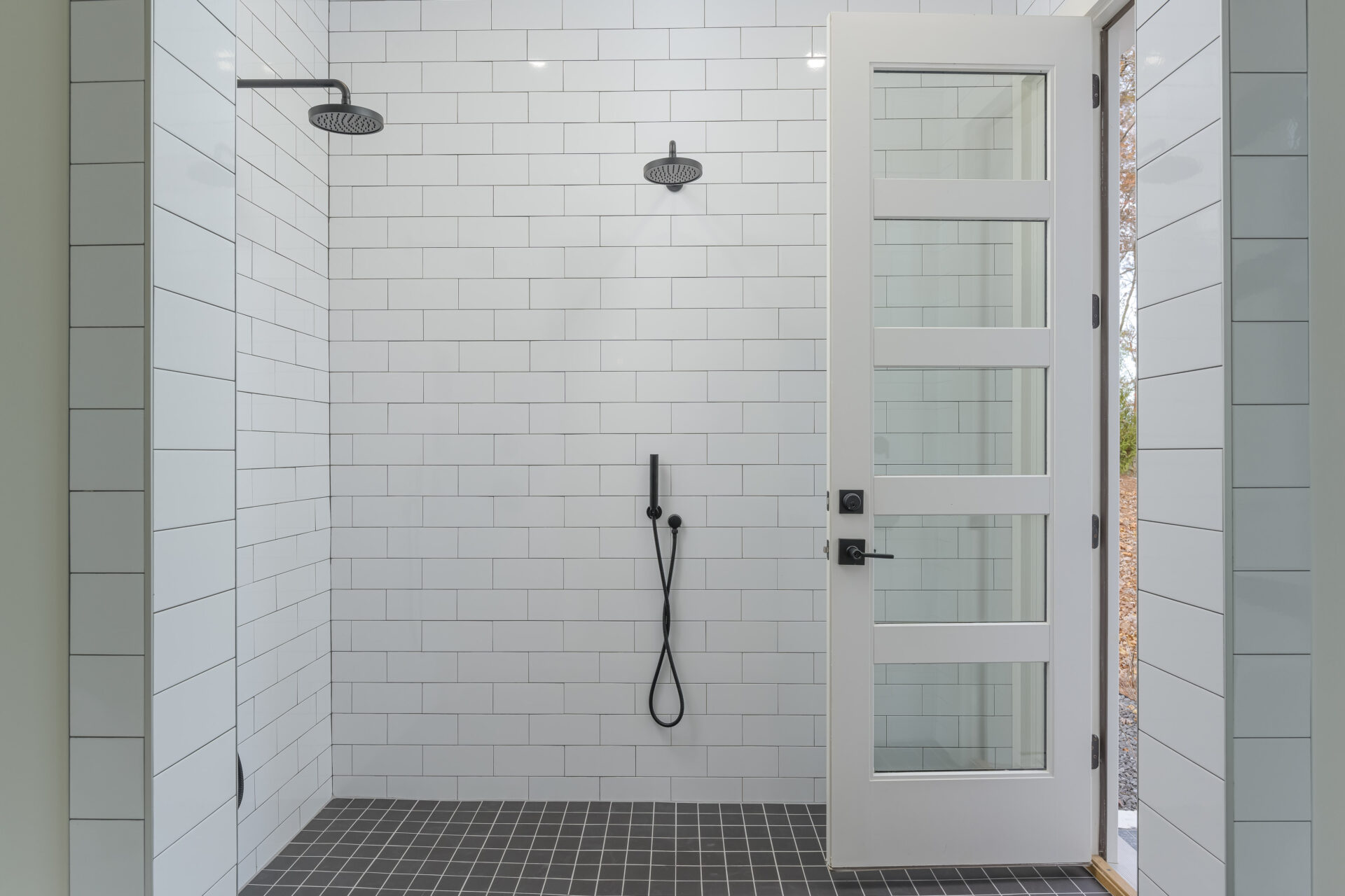 Shower with a door that leads outside at 1521 Native Tr